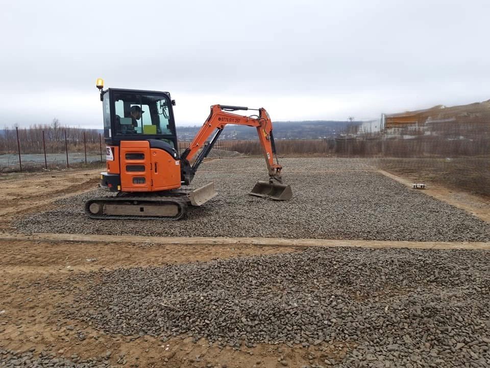 Ground preparation with excavator
